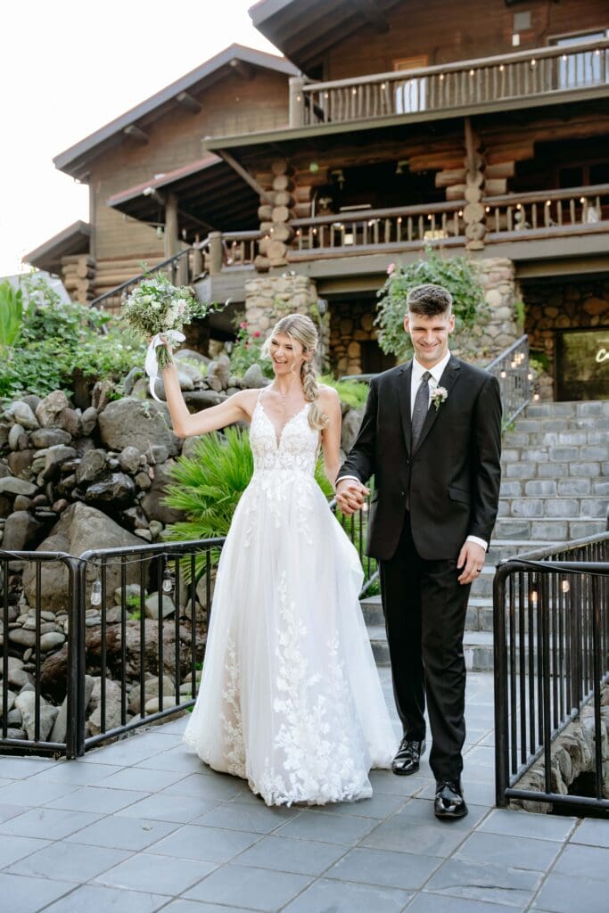 Bride and groom entering their outdoor wedding reception at Centerville Estates