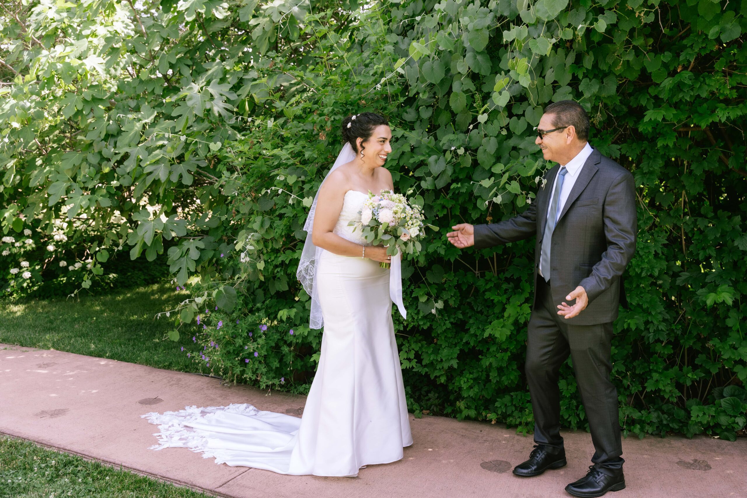 Bride's father seeing her for the first time on her wedding day