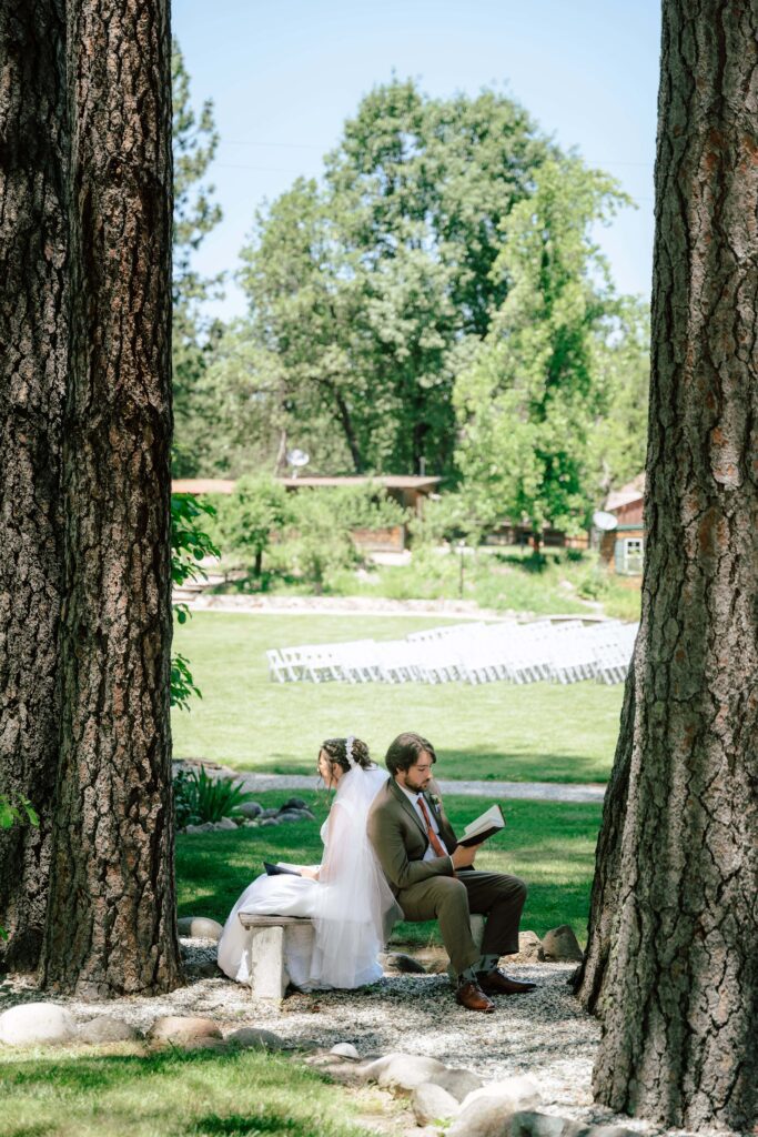 Bride and groom sharing private wedding vows during their first touch at Shadow Ridge Ranch